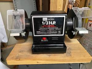 lot 51 image: Craftsman 13 Horse Power 6 x 34 Inch Bench Grinder With Meta Stand Model 257.192140