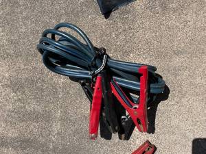 lot 48 image: 2 Sets of Jumper Cables With Three Tire Irons