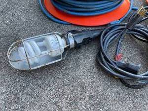 lot 108 image: Extension Cords and Shop Light