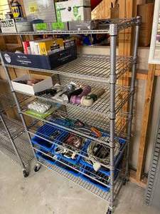 lot 143 image: 7 Shelf Metal Garage Storage Rack With Assorted Hardware