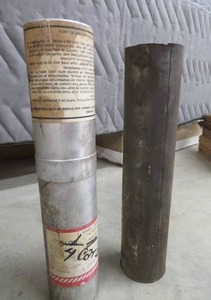 lot 59 image: CONTAINER OF CARBONS & MYSTERY WELDING ROD CONTAINER