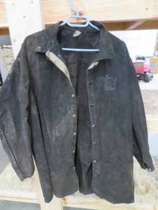 lot 104 image: BLACK JOHN BULL WELDING JACKET BY ELLIOT COMPANY