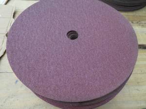 lot 180 image: STACK OF SANDING WHEELS