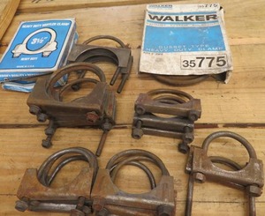 lot 228 image: BOX OF MISC. MUFFLER & EXHAUST CLAMPS