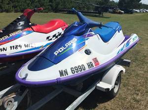 lot 2 image: 1998 Polaris SLTH & 1996 Polaris SLX Jet Skis w Karavan Trailer