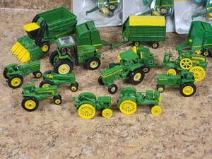 lot 121 image: John Deere Tactor Miniatures