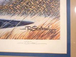 lot 64 image: Vibrant Fine Art Print by R. Schiebel - Black Dog Goldeneyes