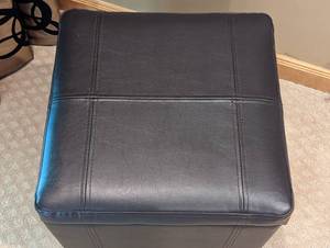 lot 39 image: Black Faux Leather Storage Ottoman