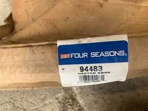 Box of Car Parts  ball joints and heater core