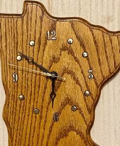 lot 66 image: Wonderful Wooden Minnesota Shaped Wall Clock