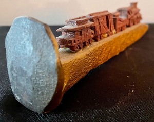 lot 174 image: Railroad Nail with a Tiny Train
