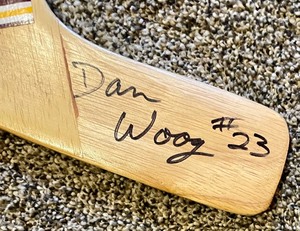 lot 210 image: Dan Woog #23 Autographed University of Minnesota Mini Hockey Stick