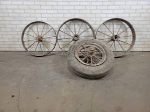 Lot of (4) Antique Steel Wheels - Largest is about 27 Diameter and 5 Wide - NO SHIPPING