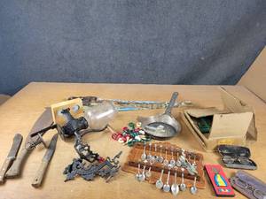 Large Lot of Antiques and Collectables - Coffee Grinder, Oil Lamp Holder, Knives, Machette, Painted Hand Saw, Apple Peeler, Antique Glasses and More