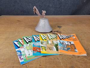 Cast Iron Wall Mount Bell and 1960s ANTUR Welsh Comic Books