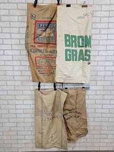 lot 22 image: Lot of (4) Vintage Feed Sacks - Sleepy Eye Flour Mill and More
