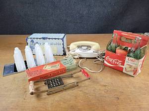 lot 44 image: BOMB Pop Molds, Vintage Telephone and Vintage French Fry Cutter w Original Box