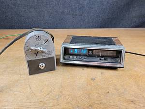 lot 62 image: Vintage Mark-Time Coin Box and GE Alarm Clock