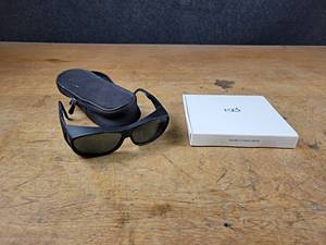 lot 63 image: Cocoons Fitover Slim Line Polarized Sunglasses, 10 pairs KD Banana Plugs