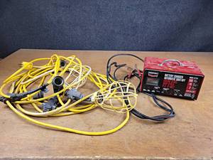 lot 70 image: Century Battery Charger and String of Temporary Lights