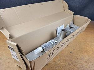 lot 134 image: New Open Box - Infinity Drain Part No. FEED 6532 PS