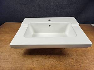 lot 142 image: KOHLER Porcelain Bathroom Sink - Part No. SV167TT7B - Overall about 25.5 x 19 x 8 - NO SHIPPING