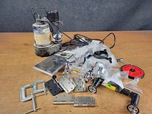 lot 146 image: Large Lot of Assorted New Plumbing Hardware and ProFlo 13hp Submersible Sump pump (Unit Powers On)