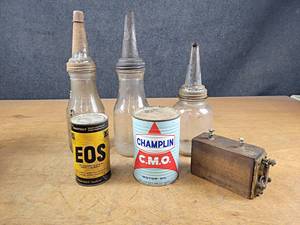 lot 162 image: Antique Glass Oil Bottles, Wood Ford Coil, Vintage EOS GM Can and Champlin Oil Can - NO SHIPPING