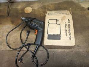 lot 25 image: Black & Decker 38 Electric Drill & Black & Decker Drill Bit Sharpener Still Works