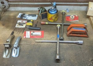 lot 47 image: Home Auto Shop Essentials-Lug Wrenches, Oil Cans, And More