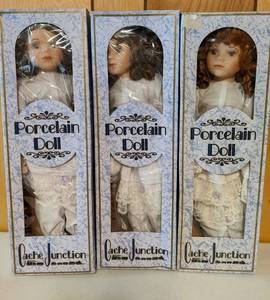 lot 63 image: 3 Vintage Porcelain 18 Cache Junction Hand Crafted & Hand Painted Collectible Meghan Doll Collection $150 Value