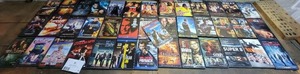 lot 91 image: 40 Movie Ultimate Action DVD Movie Collection- Bourne Supremacy, Pirates of The Caribbean,  Steven Seagal Collection & More