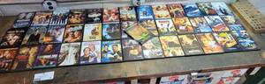 lot 96 image: 40 Movie Awesome Leading Men DVD Movie Collection- Pierce Bronson, Jet Li, Nicholas Cage, Denzel Washington, Leonardo DiCaprio And More
