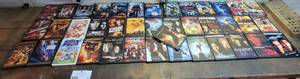 lot 97 image: 40 Movie Piece Something For Everyone DVD Movie Collection-Disney and Ultimate Action Movies, Winnie The Pooh-Machette , The Deer Hunter, & Mre