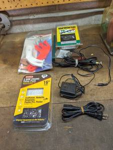 lot 106 image: Assorted Hardware-Chainsaw Blades, Knife Sharpeners, Electrical Wires, and More