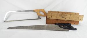 lot 109 image: Pennsylvania Saw Corp Hacksaw, Craftsman Hollow Ground Hand Saw, Rock Maple Mitre Box and Unmarked Mitre Box