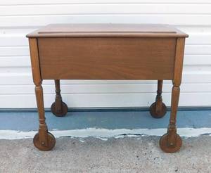 lot 35 image: Vintage Wooden Storage Box with Wooden Wheels