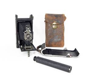 lot 7 image: Antique Kodak Eastman No. A-1 Autographic Kodak Junior Camera Model A in Original Case and Spyglass
