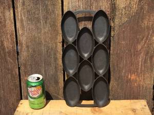 lot 16 image: Antique Cast Iron N. Waterman Boston Elliptical Muffin Gem Pan