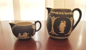 lot 39 image: Pair of Wedgwood Cobalt Blue Jasperware Creamers