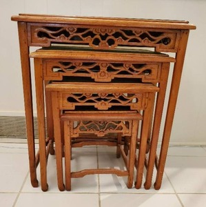 lot 62 image: Set of Four Carved Wood Nesting Tables With Glass Top