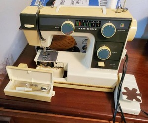 lot 290 image: Sewing Machine by New Home