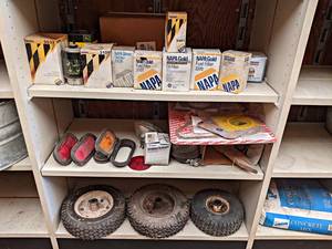 lot 85 image: Large Lot of Filters, Parts, Lights and Garden Tractor Wheels - NO SHIPPING