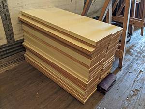 lot 153 image: Large Lot of about (40) Pressboard Shelves - About 34.5 x 8.5 x 1 - NO SHIPPING