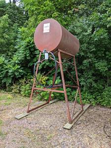 lot 5 image: Fuel Barrel on Stand - Barrel is about 38 Diameter x 64 Long - Overall Stands about 9-12 Tall - Empty - NO SHIPPING