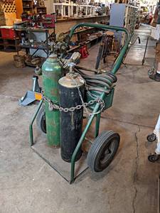 lot 8 image: Oxy-Acetylene Torch Set - Includes VICTOR Torch & Gauges, Oxygen Tank (42 Tall), Acetylene Tank (38 Tall) and Pneumatic Wheel Cart - Very Nice Setup - NO SHIPPING