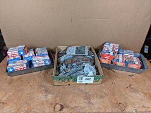 lot 202 image: Large Lot of Galvanized Roofing Nails and Storm Door Springs