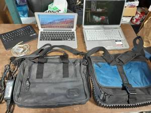 Mac Book Air (No Cords, No Info, Locked & Most Likely Unable To Open But Powers Up.
