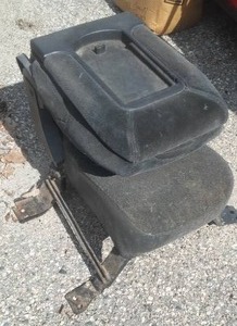 lot 35 image: Center Front Console, Flip Down Seating Storage Compartment