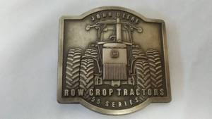 lot 97 image: John Deere Belt Buckle 1989 Row Crop Tractors